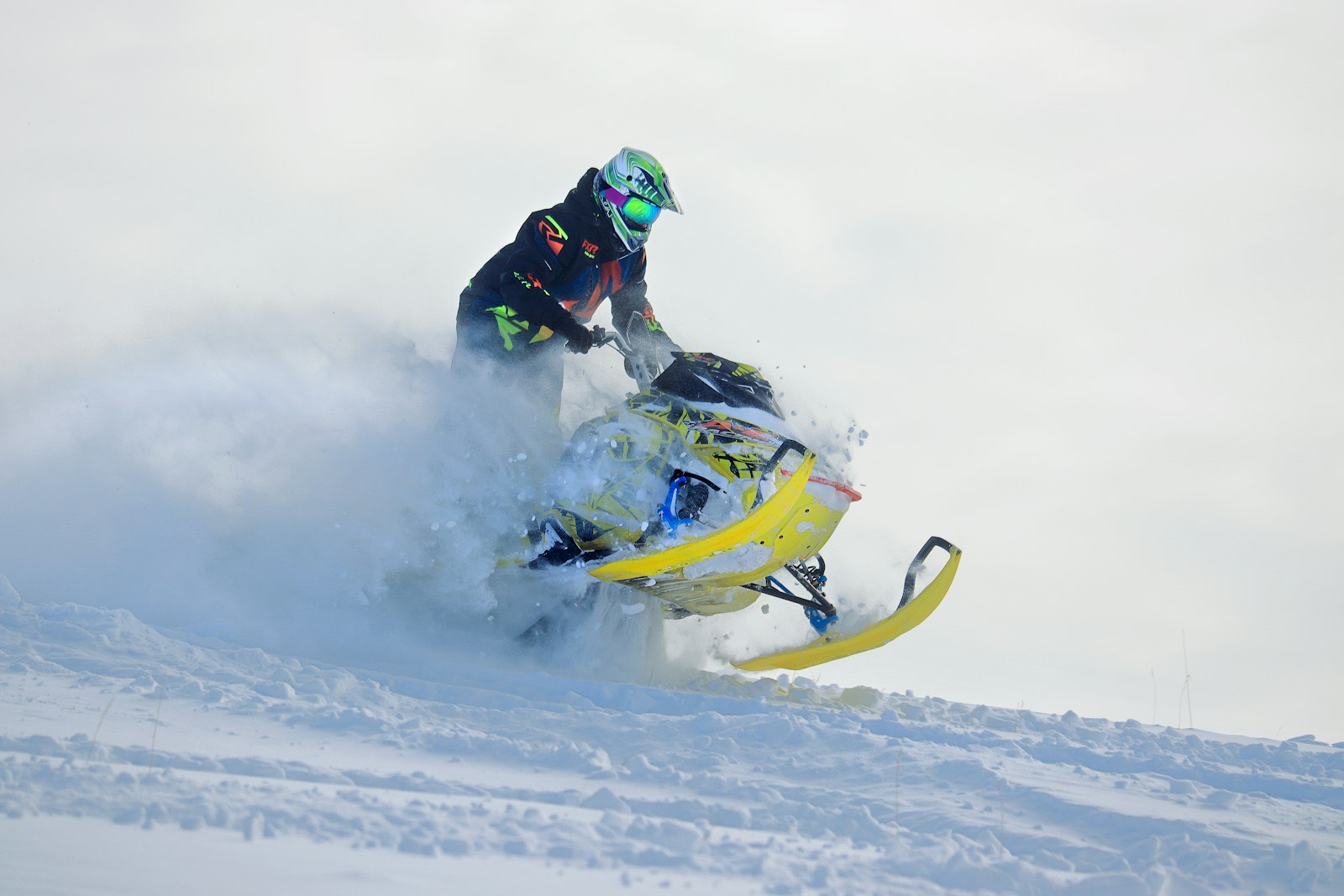 Sled pulling through deep snow under instruction