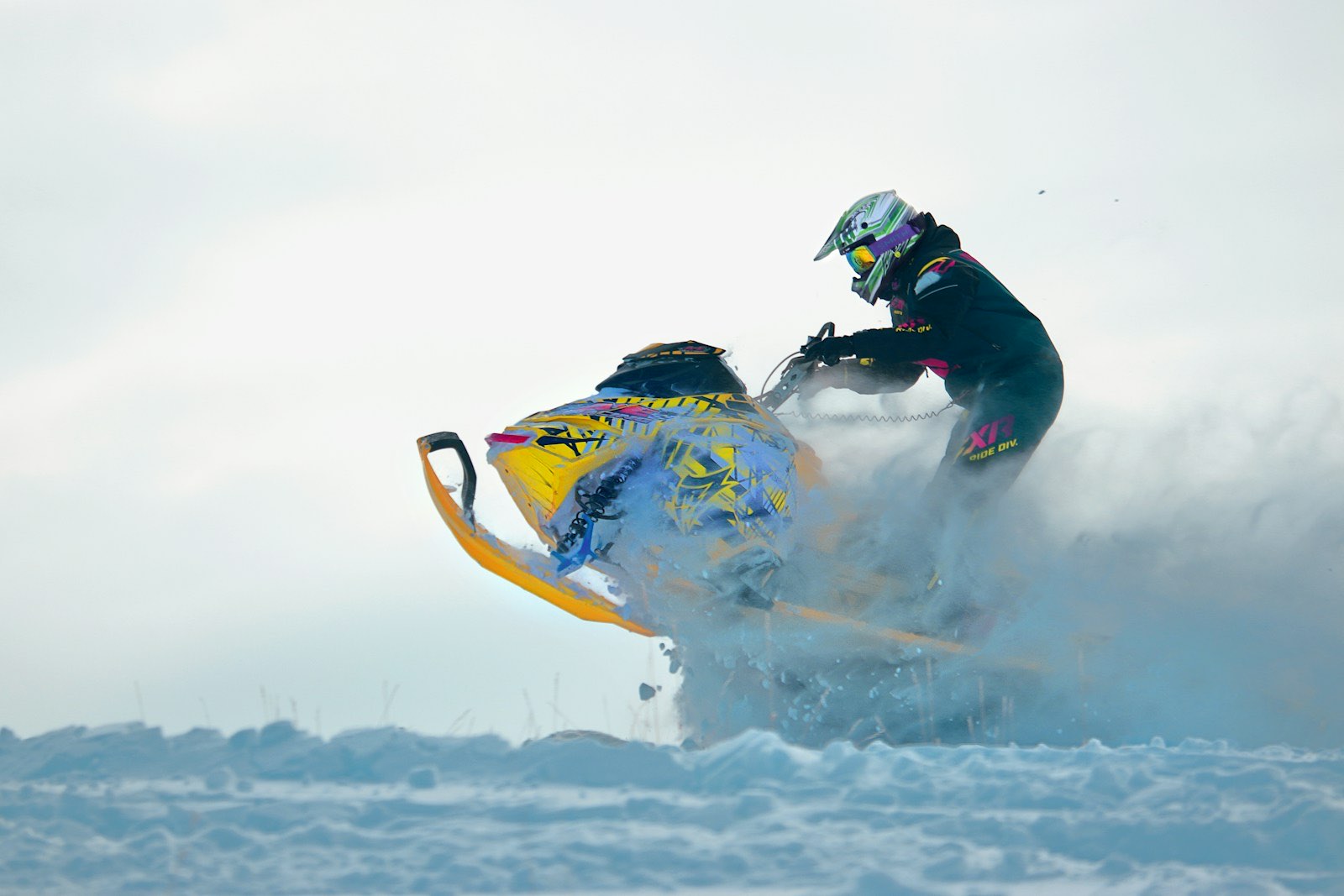 Sled on the throttle in deep snow